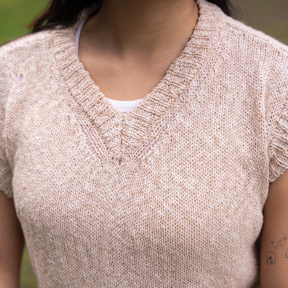 
                  
                    Distressed V-neck vest- Beige
                  
                