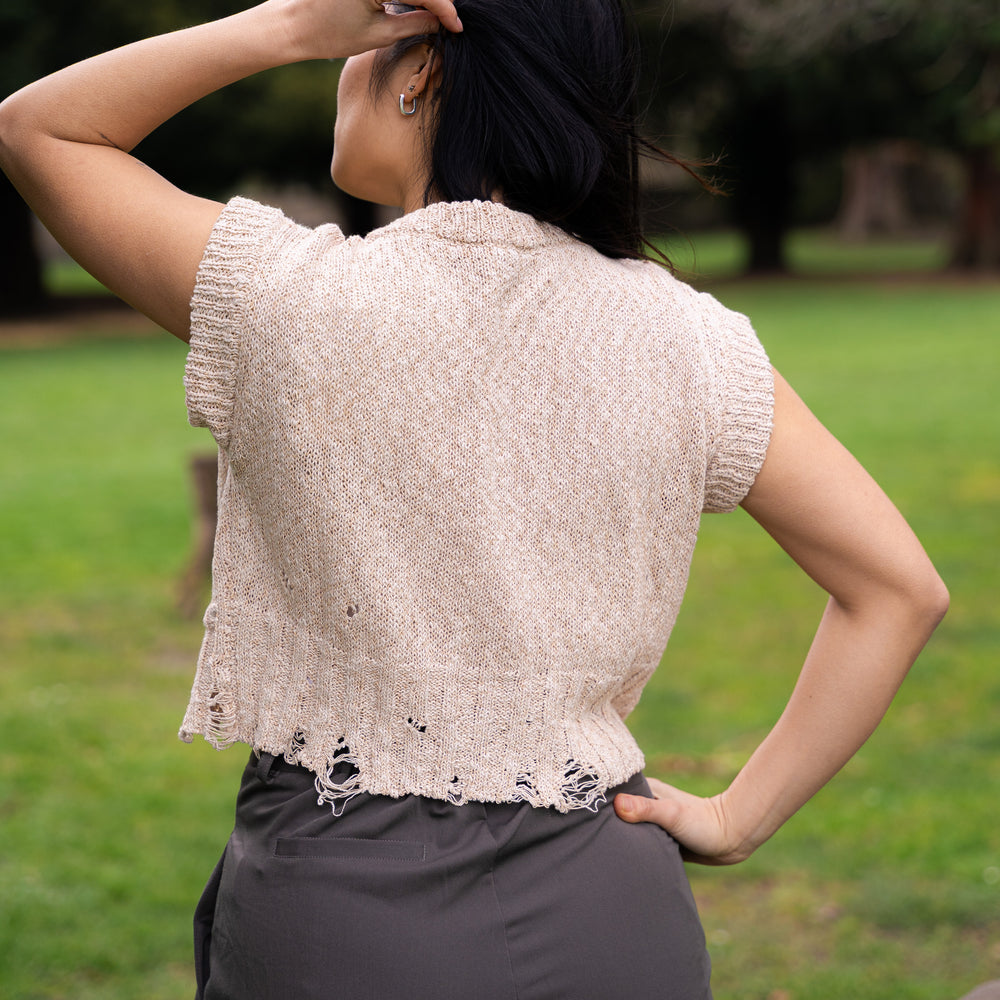 
                  
                    Distressed V-neck vest- Beige
                  
                