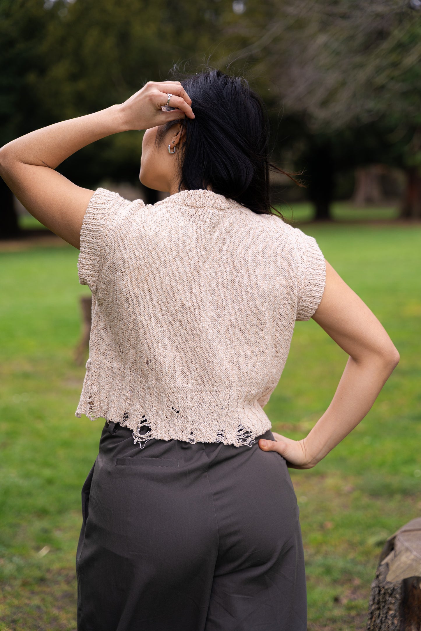 
                  
                    Distressed V-neck vest- Beige
                  
                